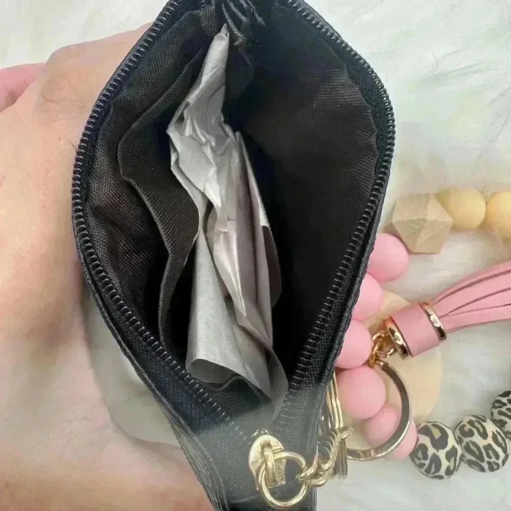 Carmella Black Wristlet Wallet with Mom Keychain tassel